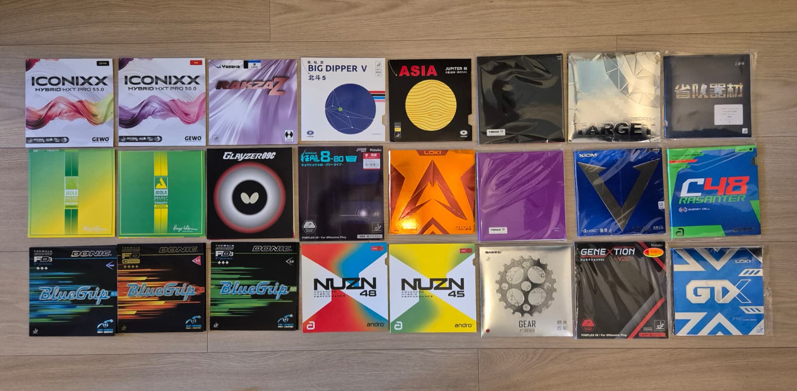 Collection of hybrid table tennis rubbers tested by Victor including Donic BlueGrip, Andro NUZN, Yasaka Rakza Z and more