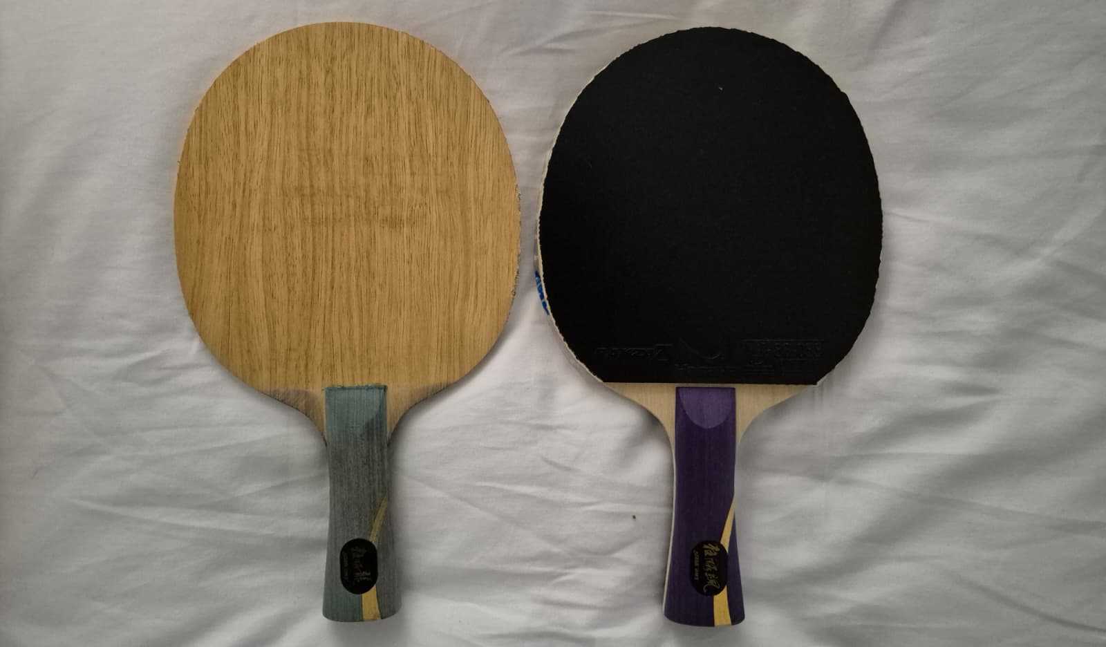 DHS Hurricane Long 5 and Sun Yingsha blades side by side